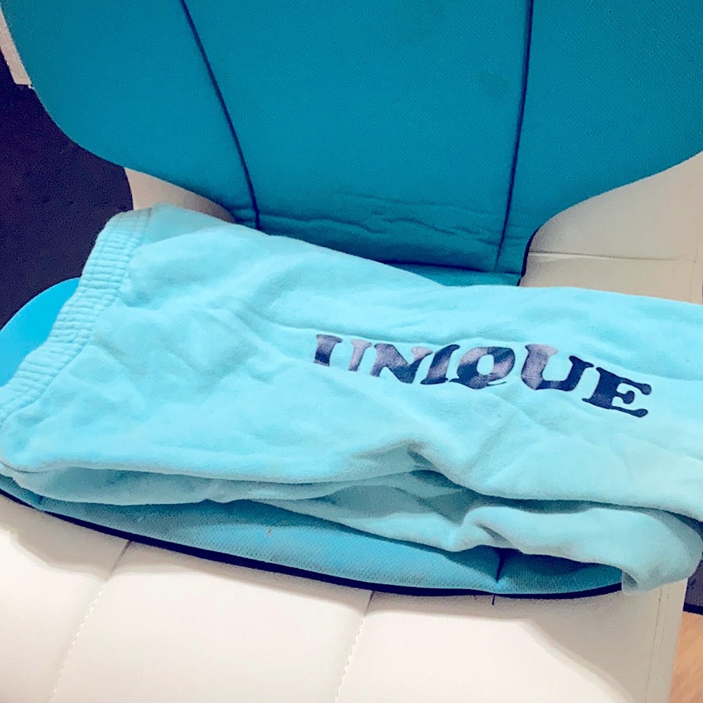 Girls sweatpants 5T with word “Unique”